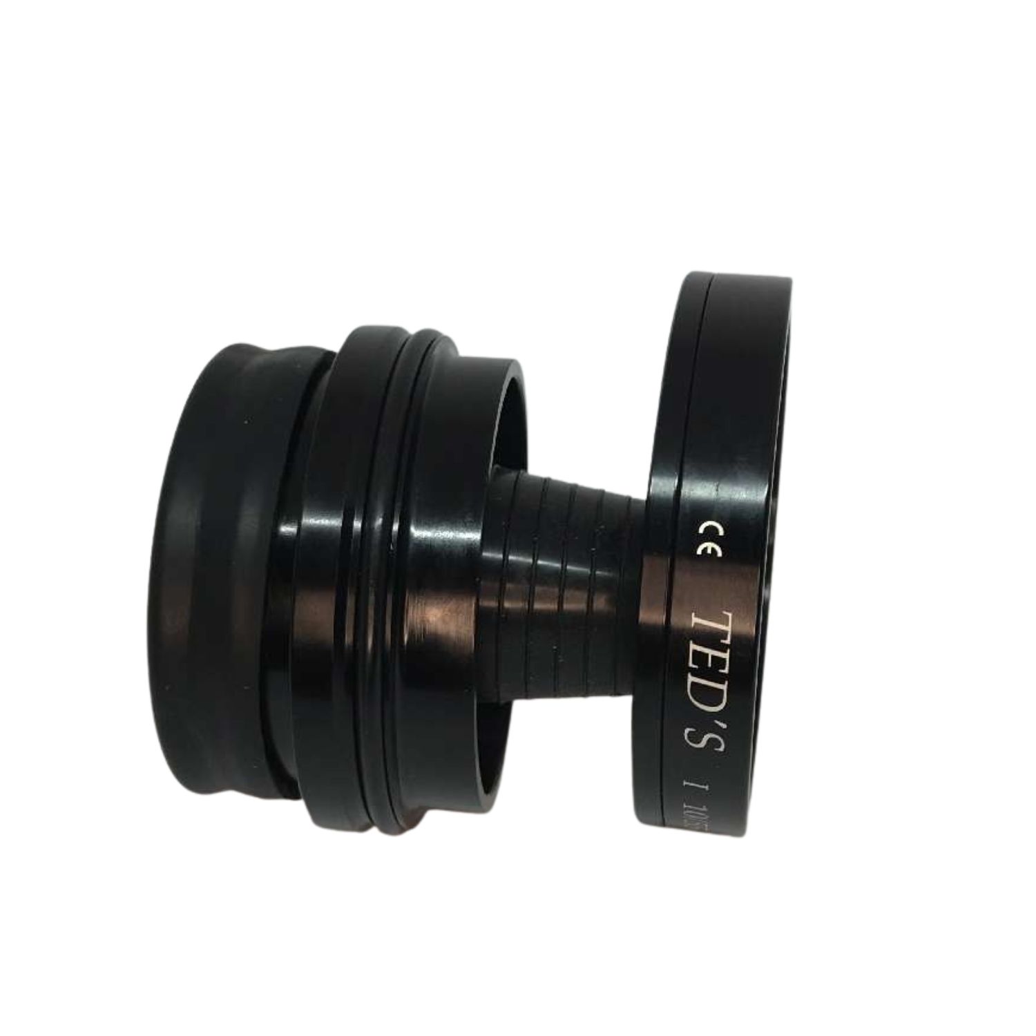 Black metal tapered bicycle headset bearing component with TED'S branding