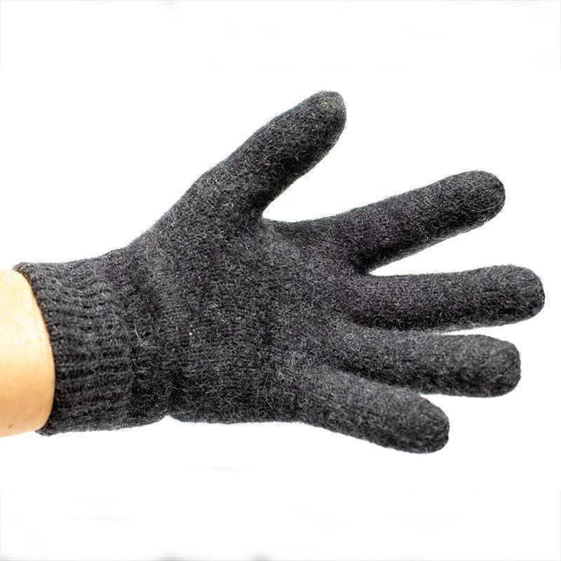 Schwarzer Wollhandschuh fĂŒr Taucher, isolierend, auf weiĂem Hintergrund, Detailansicht